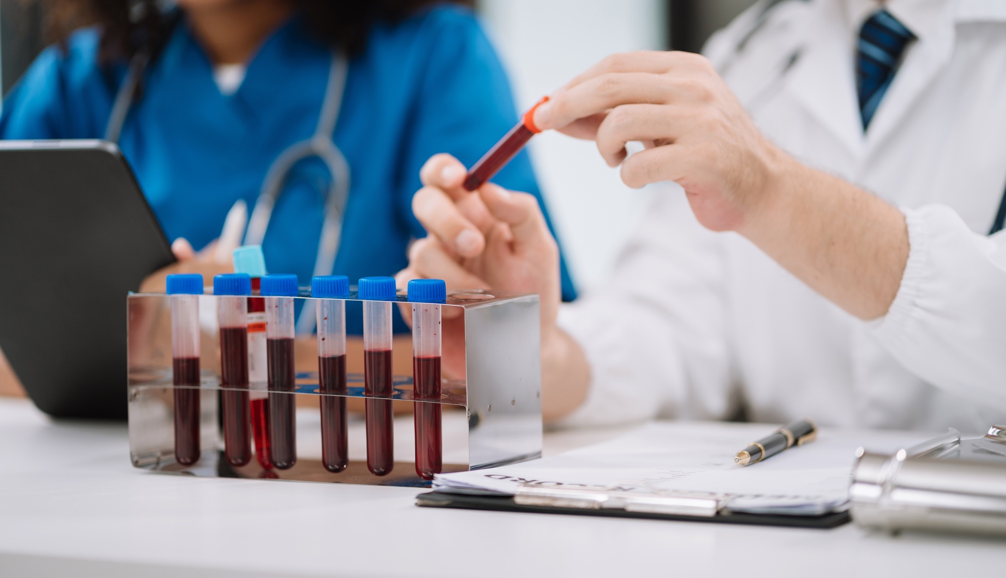 Doctor team, analysis the blood test examination results